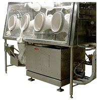 Pilot plant vertical basket centrifuge installed in a glove box barrier isolator – Model RC40VxR